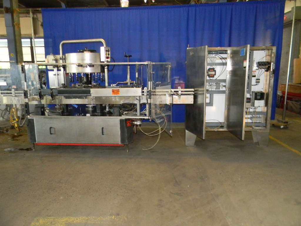 Krones 18 Head Rotary Hot Melt Cut and Stack Labeler  
